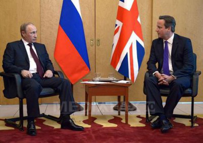 Simbol+Telefon Cameron şi Putin au discutat la telefon despre conflictul din Siria ...